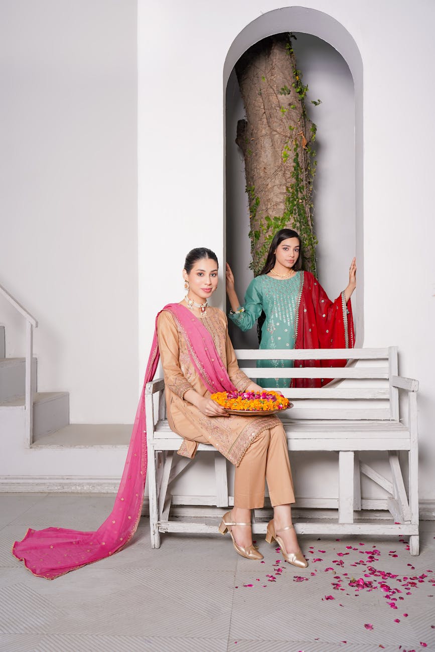 young women posing in traditional elegant clothing